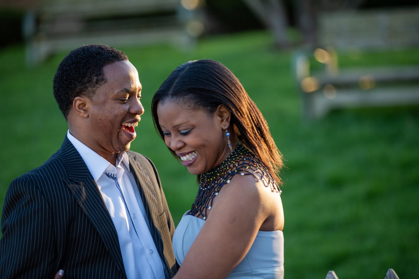 Engagement portrait with warm connection and clean outdoor light. Photograph by Samuel Mfinanga for Mfinanga Photography + Motion.